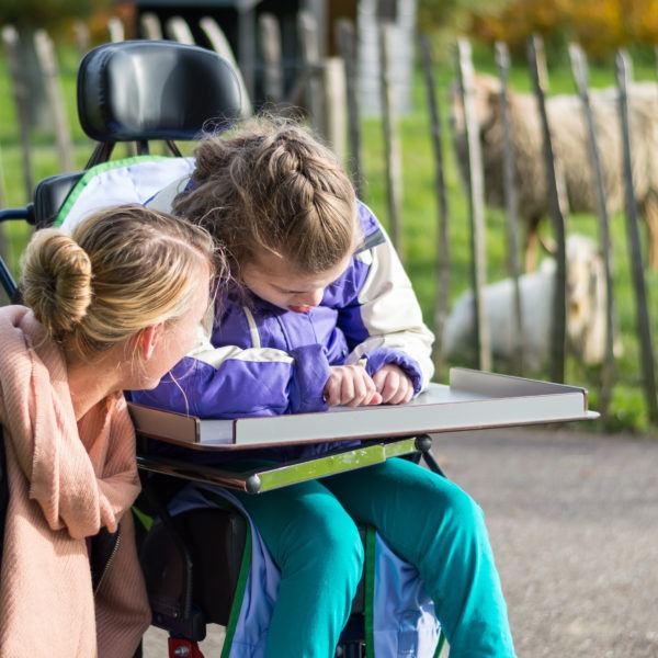 Caring for a disabled child in a wheelchair