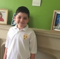 Joseph in his school uniform
