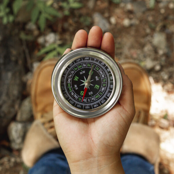 compass in palm of hand
